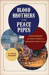 Blood Brothers and Peace Pipes: Cover showing five overlapping circles, each filled with something different. One circle includes the title text atop a purple background, one includes the subtitle text atop a red background, and one inclues the author text atop a yellow background. The other two circles depict two men on horses going through a hilly main street, and a group of people meeting in a wide open common space in their village. Behind the circles, there is a cream background with a delicate, green outline.