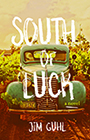 South of Luck: cover showing an old blue car in a field. The image is sepia tone with the title text written in white, all capps font, superimposed on top of it.