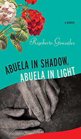 Abuela in Shadow, Abuela in Light: cover depicting red and pink geraniums in the upper left corner, atop a seafoam green background. The title text is written in black and white at the bottom of the sea foam green section, below it a grayscale photoraph of two elderly hands.